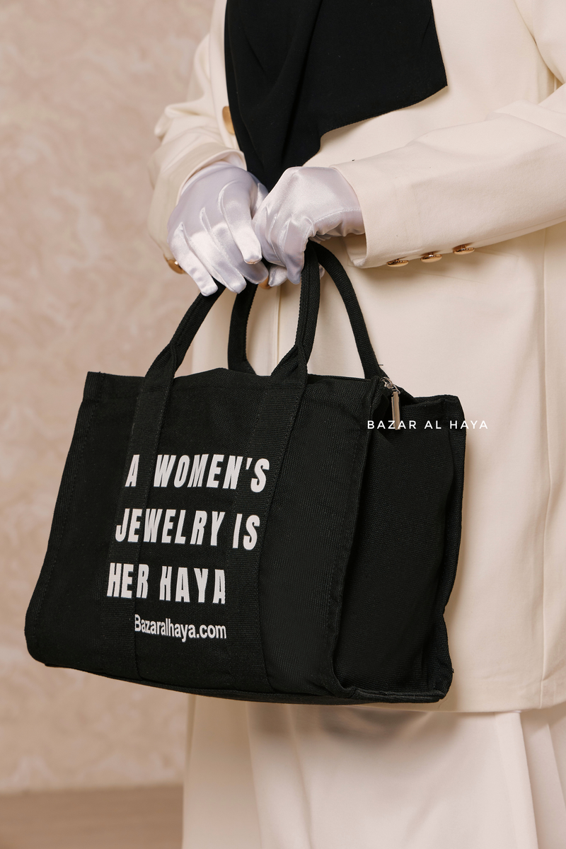 “A Women’s Jewelry Is Her Haya” Black Cotton Tote Bag - Gift