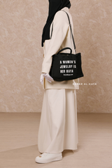 “A Women’s Jewelry Is Her Haya” Black Cotton Tote Bag - Gift