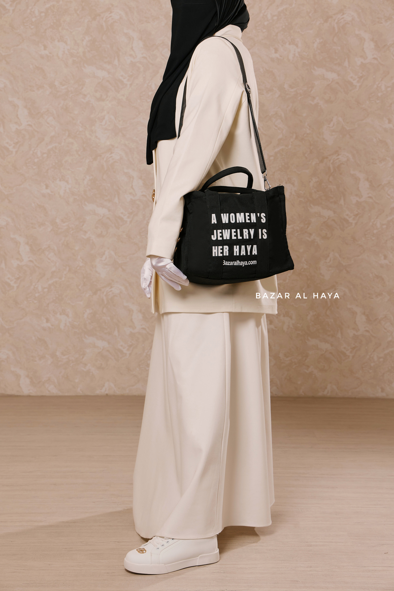 “A Women’s Jewelry Is Her Haya” Black Cotton Tote Bag - Gift