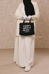 “A Women’s Jewelry Is Her Haya” Black Cotton Tote Bag - Gift