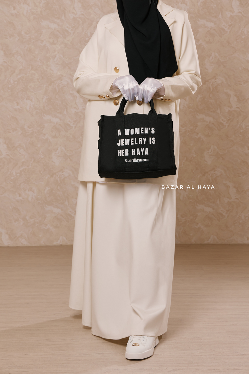 “A Women’s Jewelry Is Her Haya” Black Cotton Tote Bag - Gift