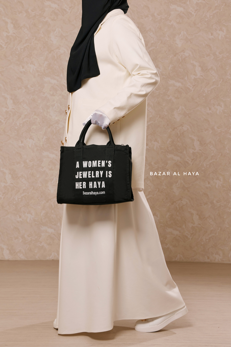“A Women’s Jewelry Is Her Haya” Black Cotton Tote Bag - Gift
