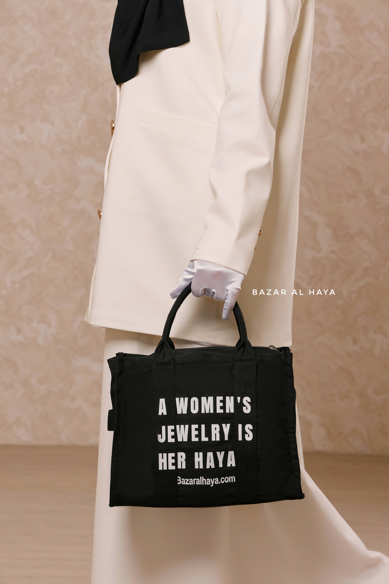 “A Women’s Jewelry Is Her Haya” Black Cotton Tote Bag - Gift