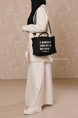 “A Women’s Jewelry Is Her Haya” Black Cotton Tote Bag - Gift