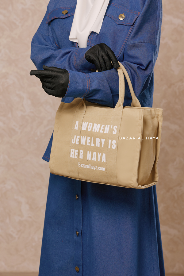 “A Women’s Jewelry Is Her Haya” Sand Cotton Tote Bag