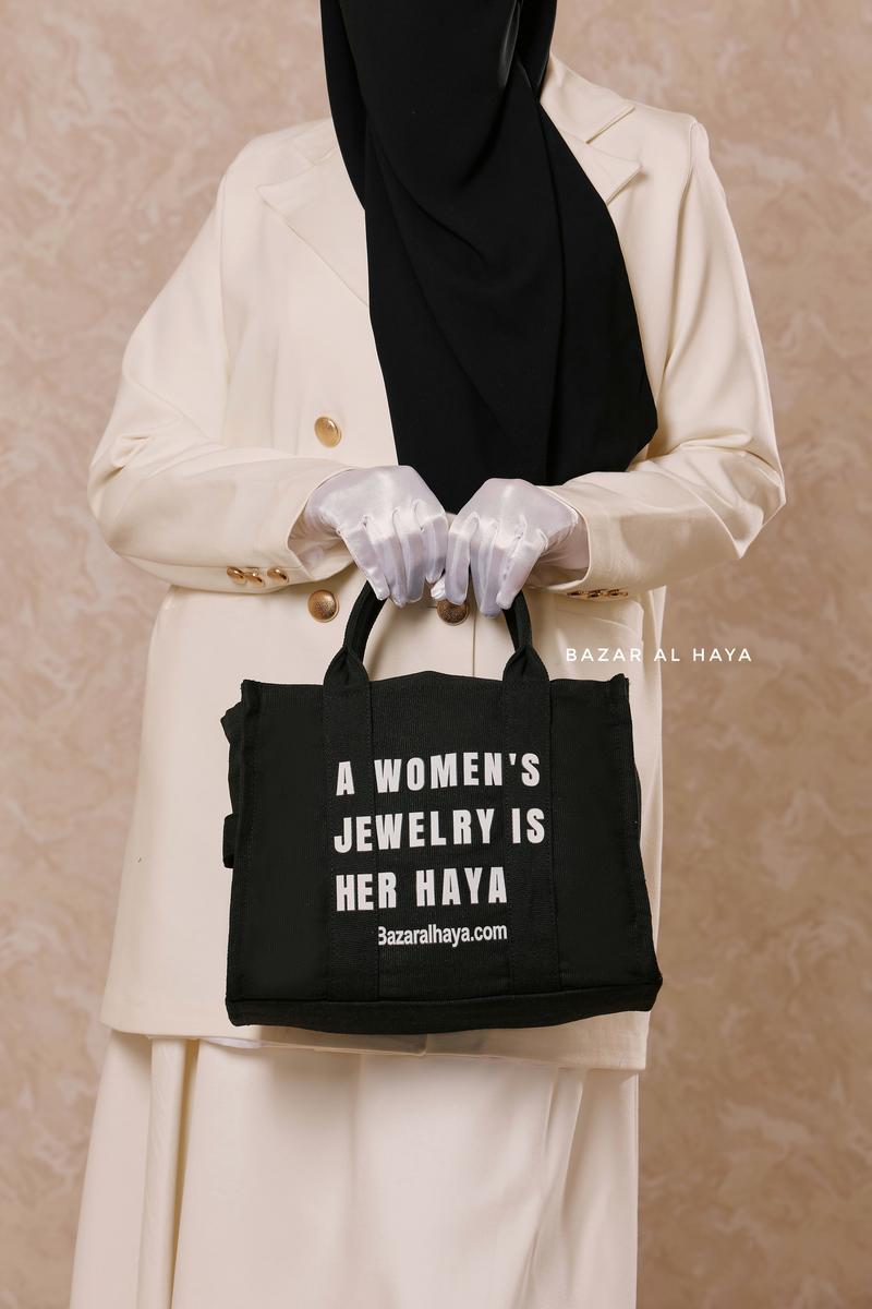 “A Women’s Jewelry Is Her Haya” Black Cotton Tote Bag - Gift