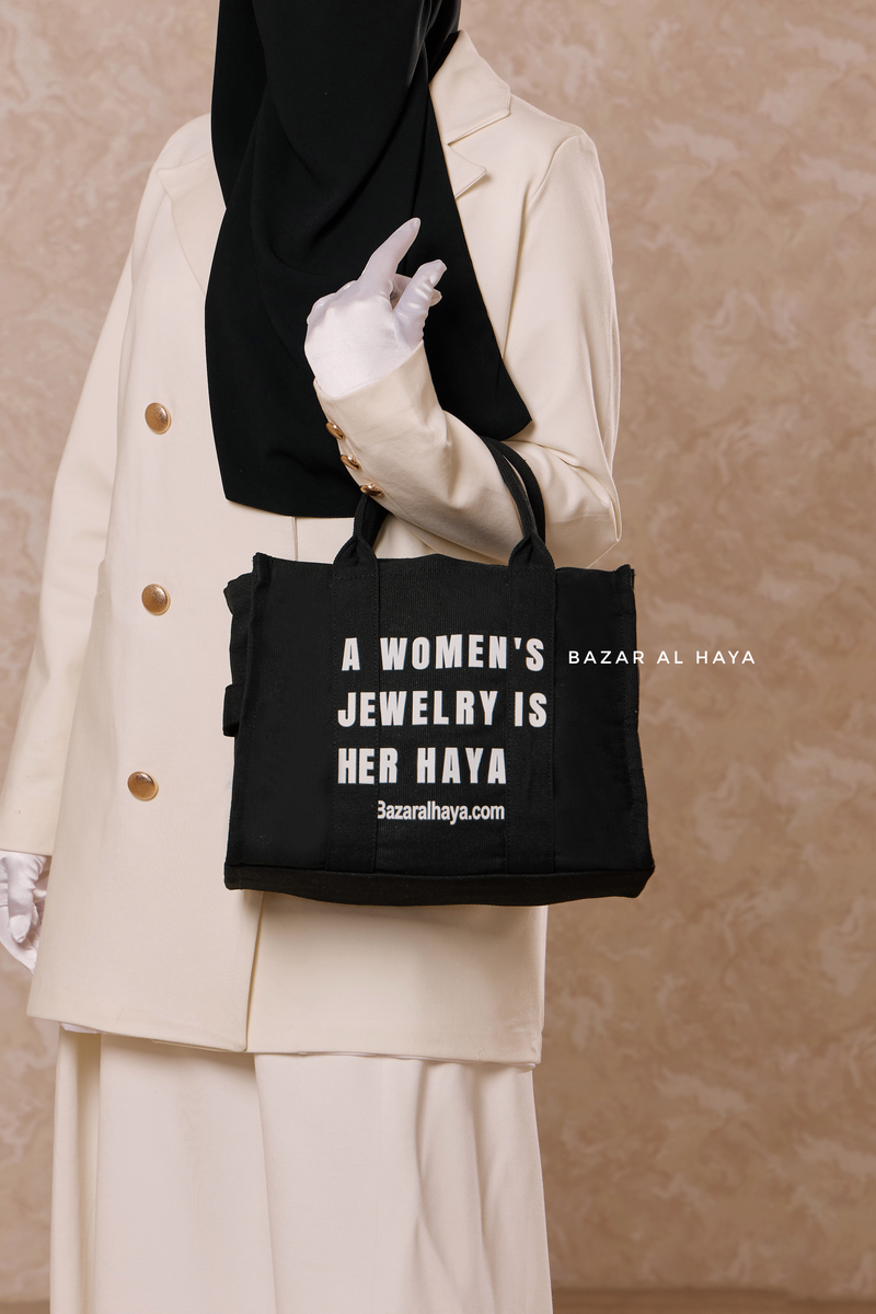 “A Women’s Jewelry Is Her Haya” Black Cotton Tote Bag - Gift